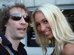 Denis makes friends with one of the Yamaha umbrella girls