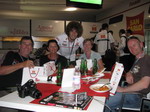 Saturday night MotoGP Night dinner with the team. We met most riders; joined here by Simoncelli (with our 'gift bags' from the team)
