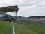 View from VIP VIllage terrace looking towards VIP Village private stand on inside of first corner Copse (Copse G/S in background).