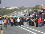 Under the podium, Lorenzo fans celebrate his victory
