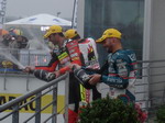 Talmasci, Bradl and de Meglio celebrate a great 125cc race