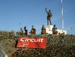 Circuit entrance with famous busts of Nieto, Agostino, Doohan and other champions