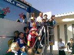 Launch of Dr Costas new book at Jerez; on stair from top/right Vermeulen, Melandri, (unknown), Costa, (unknown), Rossi, Agostini, Pedrosa, Hayden, Lorenzo, Locatelli