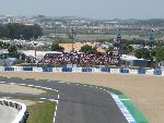 The small X0 stand - super view of penultimate corner and closer to bikes than X1