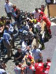 Sotner (first podium at Jerez!), Rossi and Pedrosa in park ferme (our VIP suite is just above it)