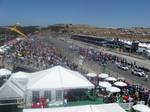 View from control tower towards MotoGP start. Umbrellas in lower right are Pole Position Club suite