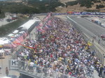 Turn 11 grandstands; our Pole Position Club suite comes with seats on rightmost (closest in view) section, directly overlooking start
